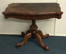 A Victorian hinged top card table.