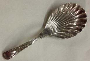 An 18th Century Georgian silver fluted caddy spoon.