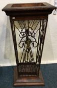 An unusual cast iron mounted stick stand.