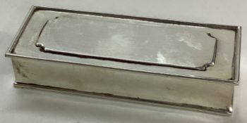 An early 20th Century large American silver triple stamp case.