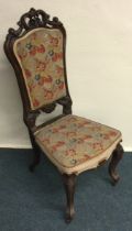 A good Victorian scroll dining chair with tapestry seat.