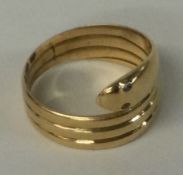 A good antique 18 carat gold snake ring with diamond eye.