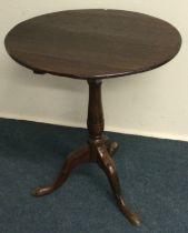 A Georgian mahogany pedestal table of circular form.