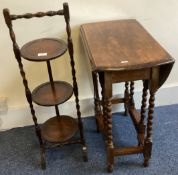A barley twist cake stand together with a drop leaf table.