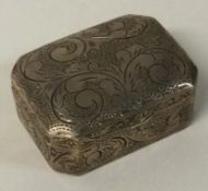 An engraved silver hinged box.