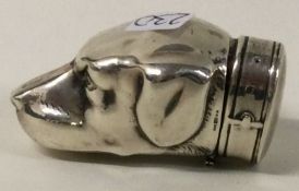 A silver hallmarked combination vesta / snuff box in the form of a dogs head.