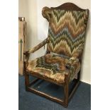 A good early oak chair with tapestry padding to stretcher base.