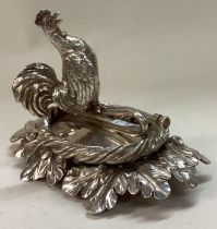 A Georgian silver figure of a musical cockerel.