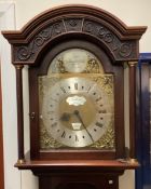 A reproduction mahogany cased clock.