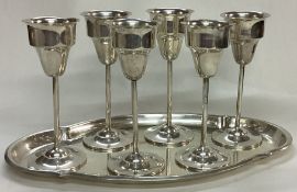 A Continental silver spirit set on tray.