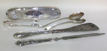 A silver mounted shoe horn together with a brush etc.