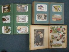 Two postcard albums together with a loose bag of mostly early 20th Century postcards.