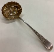 A rare George III silver pierced berry sifter spoon.