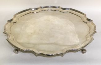 A large circular silver salver.