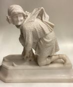A good carved marble figure of a lady with skis with textured body.