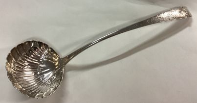 DUBLIN: A fine 18th Century Irish silver engraved soup ladle.