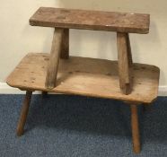 Two rustic pine stools.
