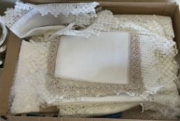 A box containing lace items.