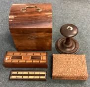 Two rosewood cribbage boards together with a domed top caddy.