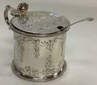 A Victorian silver engraved mustard pot.