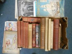 BOOKS: A box of various illustrated books and magazines.