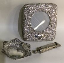 A silver mounted picture frame together with a bon bon dish etc.