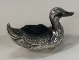 A novelty English silver pin cushion in the form of a duck.