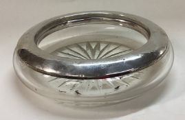 An English silver and glass dish.
