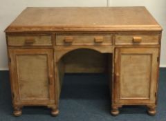 A good stripped wood two drawer desk. Est. £30 - £