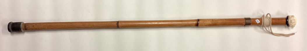 An old sword stick of tapering form.