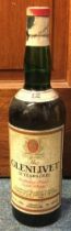 A 1980's 26 2/3 fl ozs bottle of Glenlivet 12 Year