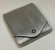 A silver mounted card holder.