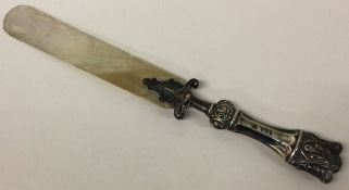 A silver and MOP letter opener.