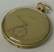 A 14 carat gold pocket watch with gilt dial.