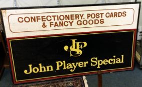 A large John Player Special advertising board.