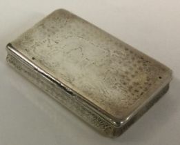 A 19th Century French silver snuff box engraved with dog scenes.