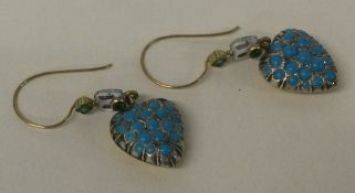 A pair of Georgian style heart shaped turquoise set earrings with loop tops.