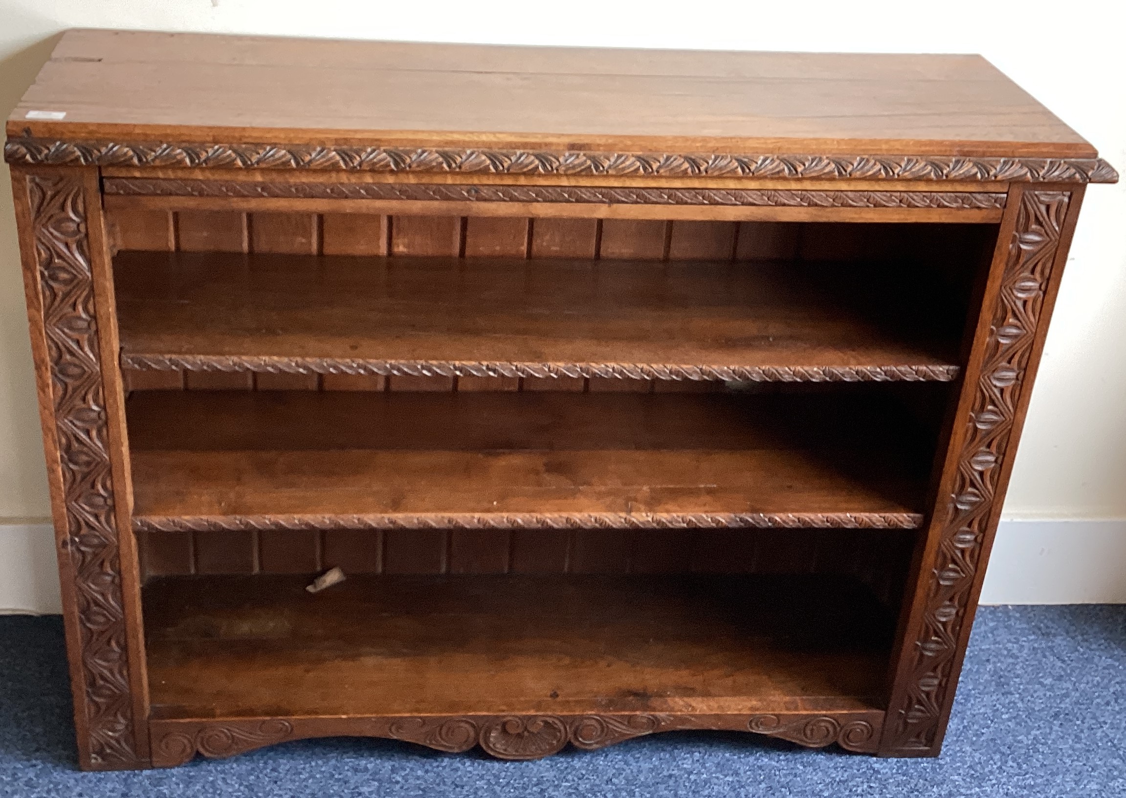 A heavy carved oak book case with shell decoration. - Image 2 of 2