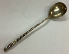 A fine 19th Century Russian silver spoon engraved with temples to the back.