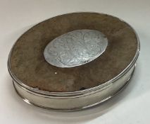 An 18th Century silver, wood and tortoiseshell snuff box with lift-off lid.