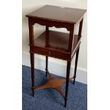 A good mahogany bedside cabinet on tapering supports.