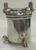 An early 19th Century silver lidded beaker with early coin to centre.