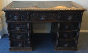 A good Edwardian carved twin pedestal desk.