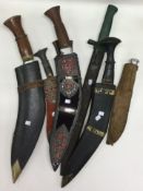 A good collection of Gurkha knives together with a bayonet.