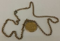 A 1918 Half Sovereign on fine link chain.