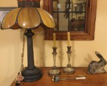 A large stained glass lamp, candlesticks etc.