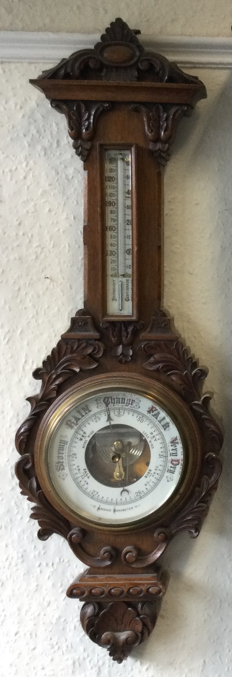 A good carved oak barometer.