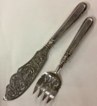A fine pair of 18th Century Russian silver pierced fish servers.