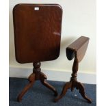 A good Victorian mahogany tilt top table together with one other.