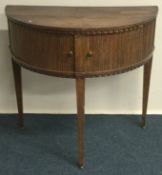 A good oak side table of shaped form on tapering s